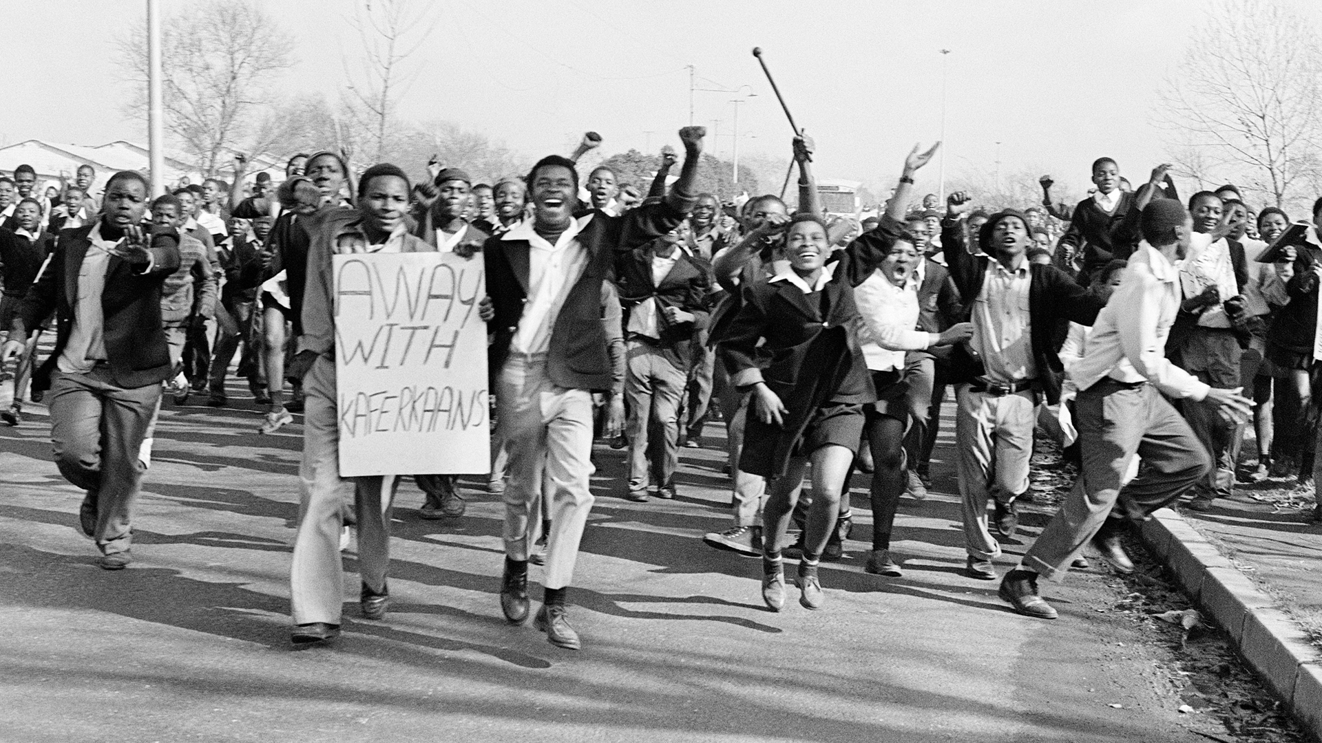 <p>High school students in Soweto, protesting against government’s enforcement of Afrikaans as the sole language of instruction, spark a series of countrywide protests that shake the apartheid state.</p>